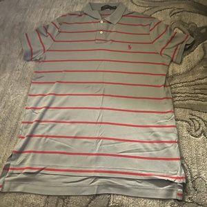 This is a men’s polo shirt size medium only worse once